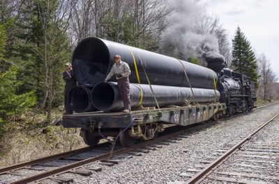 2nd Photo of Train Transporting the new culvert to the lamothe site in April 2013.